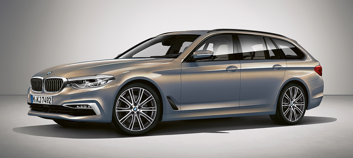 BMW Individual BMW Série 5 Touring BMW Individual BMW Série 5 Touring G31 Champagner Quarz metallic vue de trois-quarts de profil
