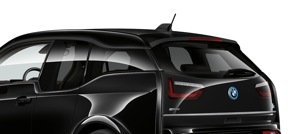 BMW i3s Edition RoadStyle 2019 vista posteriore a tre quarti I01 BMW i3s Edition RoadStyle Fluid Black con profilo in E-Copper vista posteriore a tre quarti I01