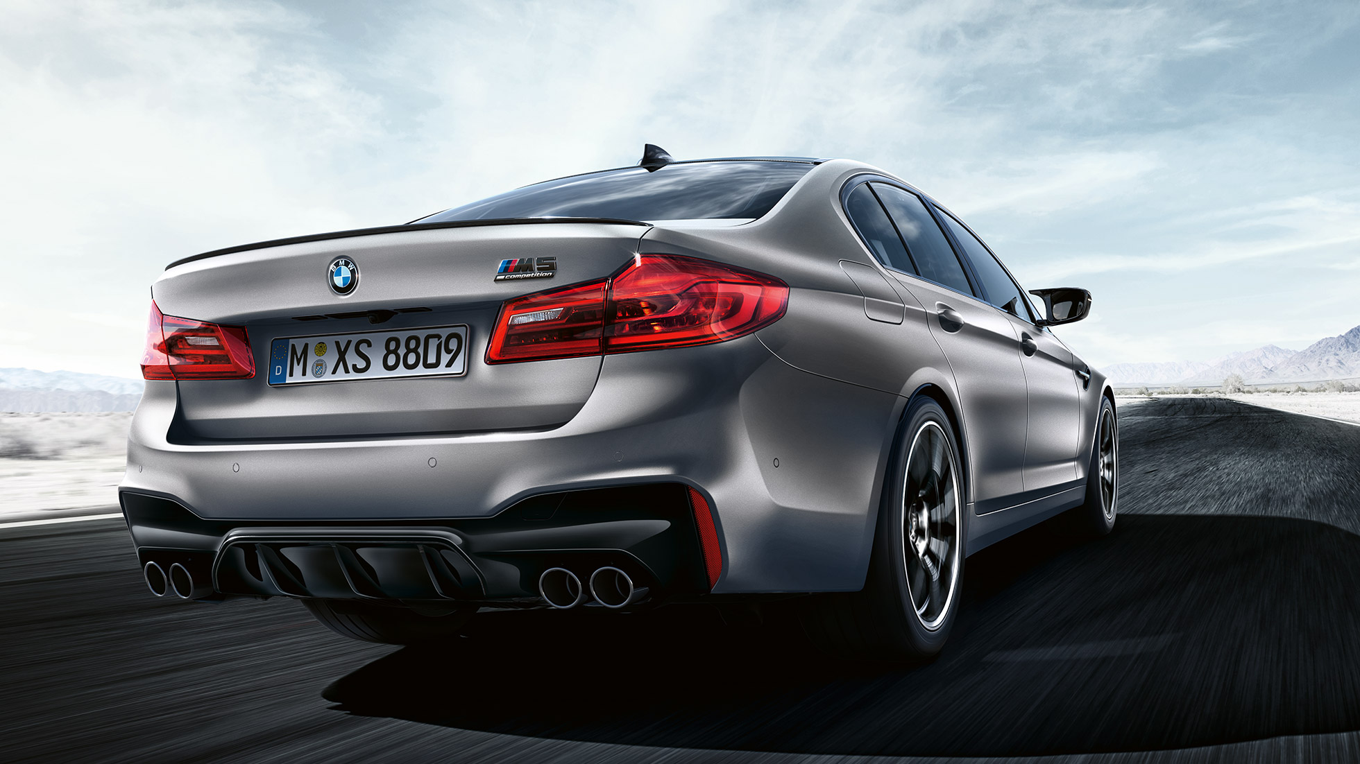 LED-Heckleuchten. BMW M5 Competition Design Dreiviertel-Heckansicht.