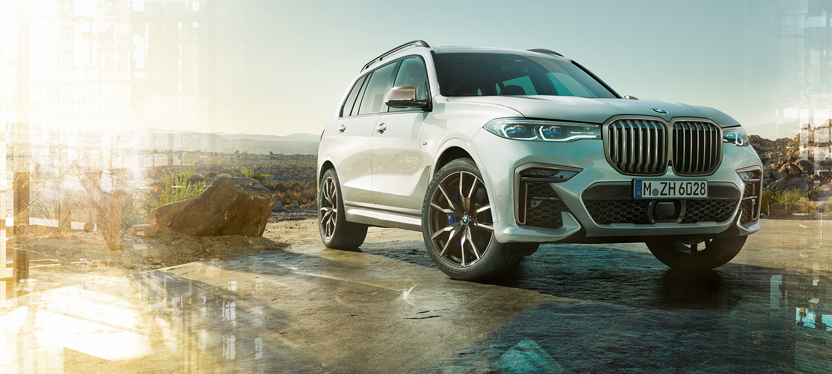 BMW X7 M Automobil, Dreiviertel-Frontansicht links G07 BMW X7 M Automobil in Mineralweiss, G07, stehend, Dreiviertel-Frontansicht links
