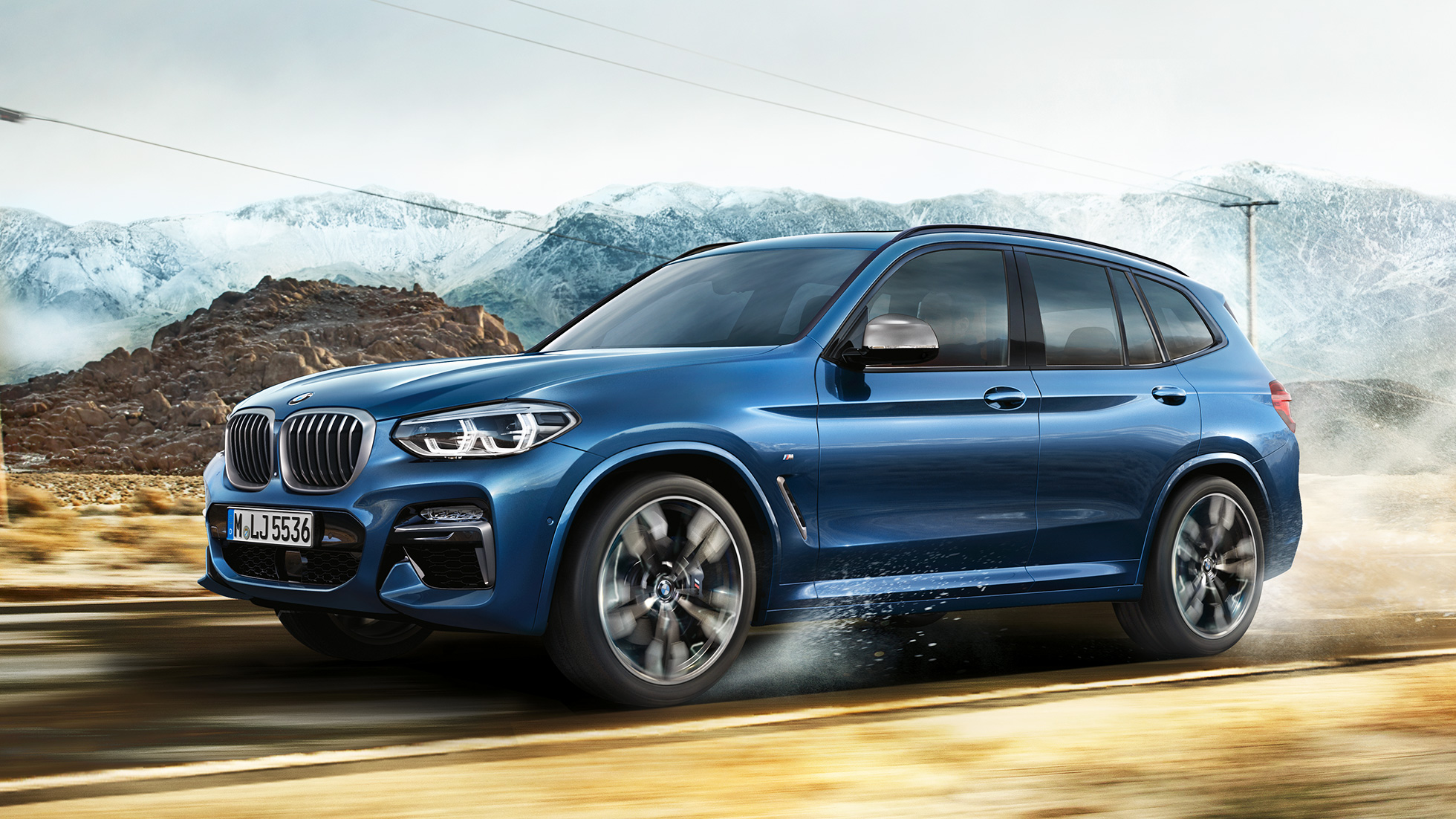 BMW X3 M40i, Halbtotale Felge und Kotflügel vor Gebirge g01 BMW X3 M40i, Halbtotale Felge und Kotflügel vor Gebirge g01