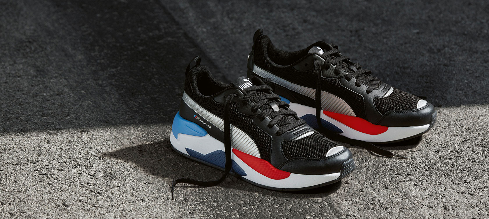 Scarpe Puma X-Ray BMW M Motorsport. L’immagine mostra le scarpe Puma X-Ray BMW M Motorsport.