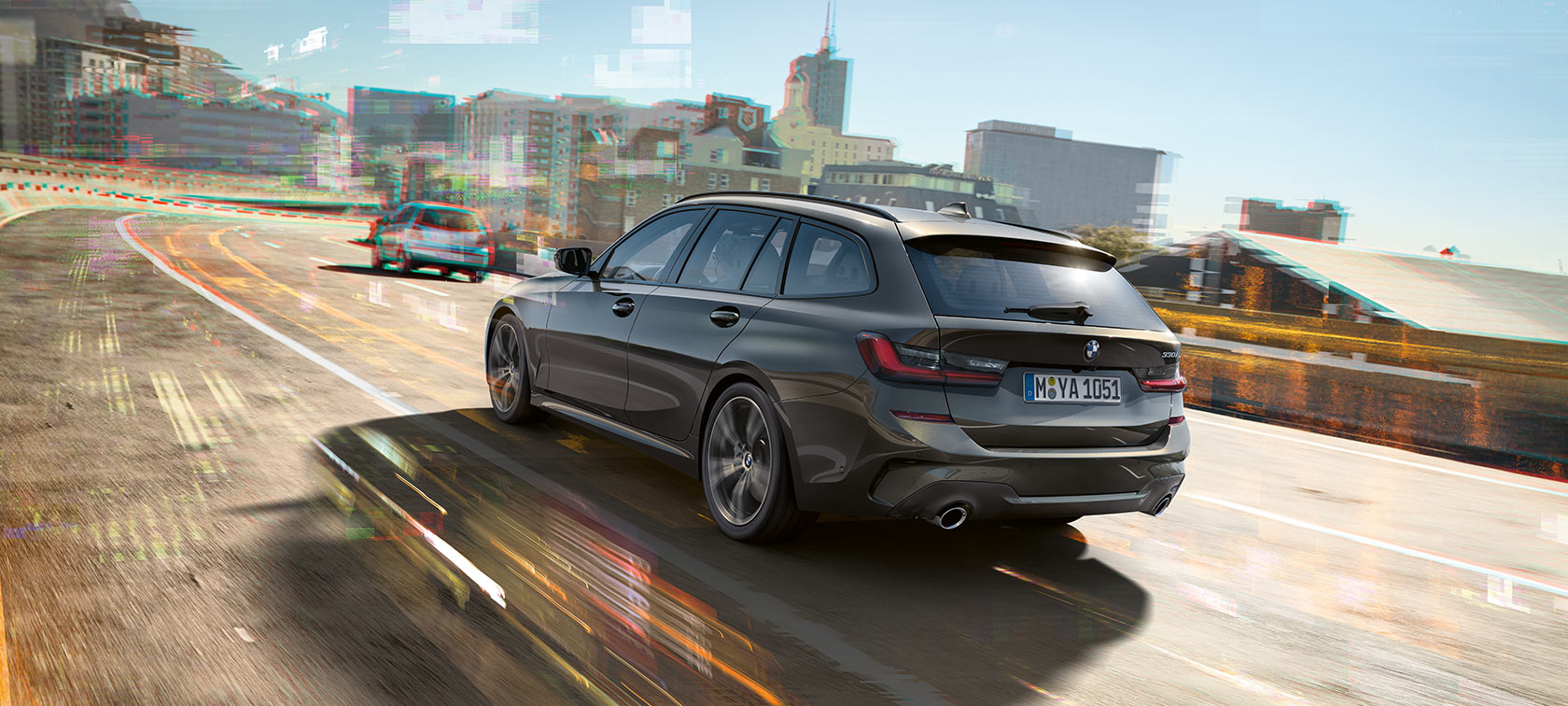 Piccola città BMW Serie 3 Berlina BMW/Serie 3 Touring/nera/di lato da davanti/piccola città
